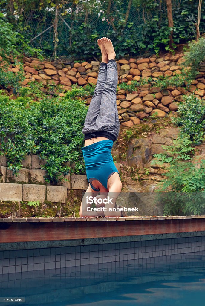 Mastering her mind and body Shot of a young woman practicing yoga outdoorshttp://195.154.178.81/DATA/i_collage/pu/shoots/796805.jpg 2015 Stock Photo