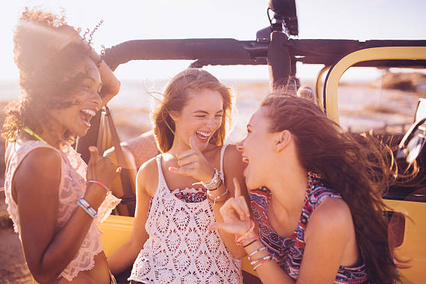 istock Mixed racial group of friends on road trip at beach 470643238