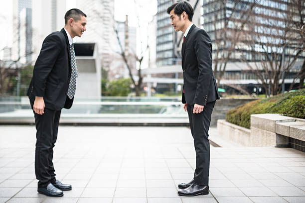 istock japanese Business greetings together on the downtown 470643830