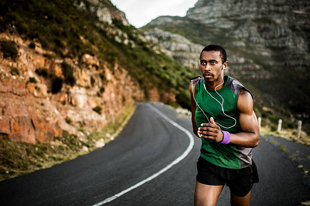 istock Fit athlete looking determined and focused as he exercises 470643898