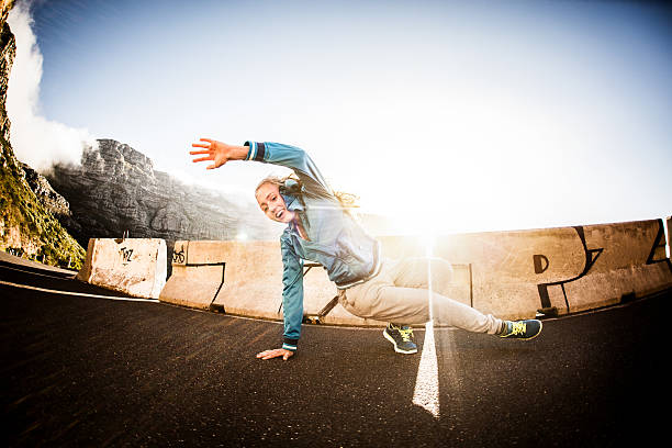 istock Teenage b-girl breakdancing with strength and flexibility 470644516