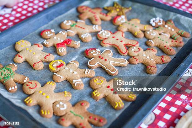 Raw Gingerbread Men With Glaze On A Baking Sheet Stock Photo - Download Image Now - Adult, Baked Pastry Item, Baking