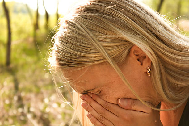 istock allergy woman sneeze 470648378