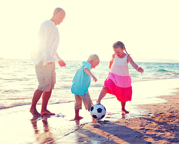 istock Father Daughter Son Beach Fun Summer Concept 470648636