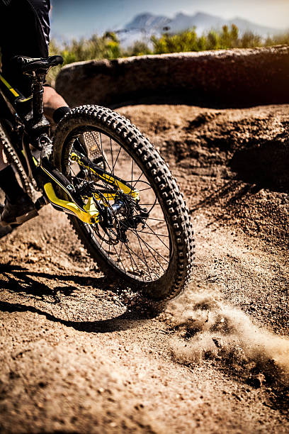 istock Mountain bike tire with good tread on a dirt path 470648950