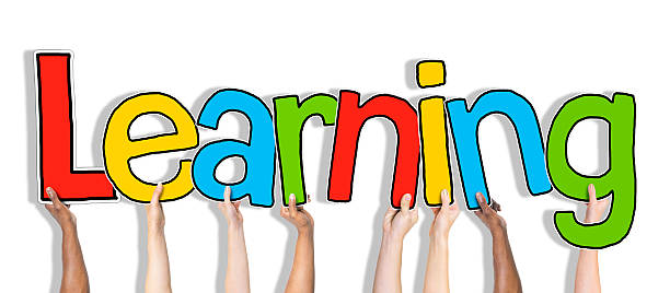 istock Group of Hands Holding Learning Word Concept 470650568
