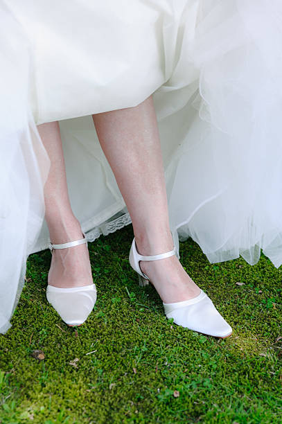 istock Beautiful leg of the young bride 470651473