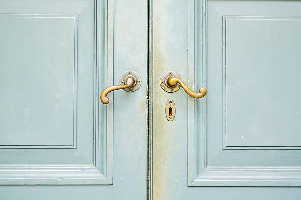 istock Door handles and wood door 470652016