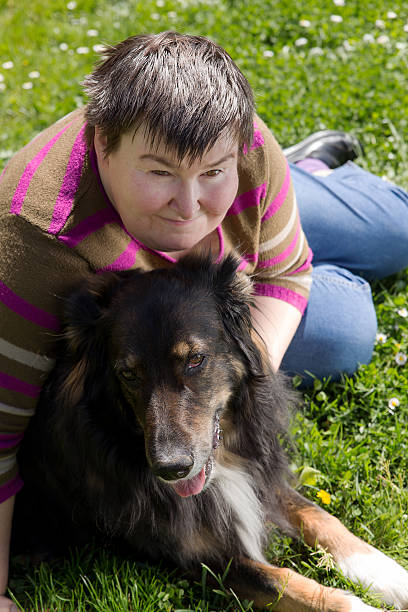istock disabled woman lying on a lawn 470656378