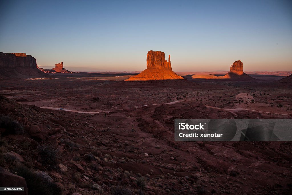 Sunset of Mittens and Merrick Butte The Mittens and Merrick Butte, Monument Valley, Arizona, USA 2015 Stock Photo