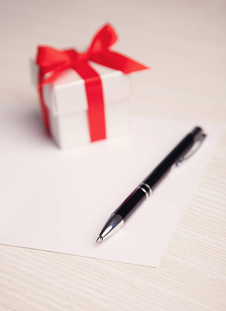 istock blank card with purple flowers and gift 470656518