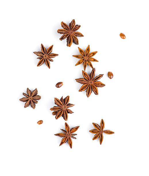 Star anise on white background Photo of star anise on white background anise stock pictures, royalty-free photos & images
