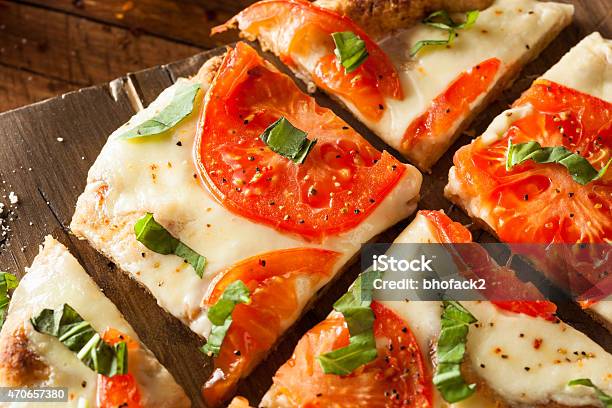 Homemade Margarita Flatbread Pizza Stock Photo - Download Image Now - 2015, Appetizer, Baked