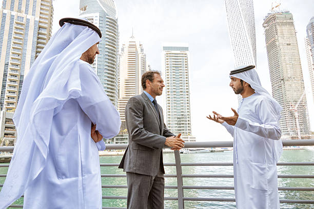 istock Middle eastern businessmen meeting western man 470661316