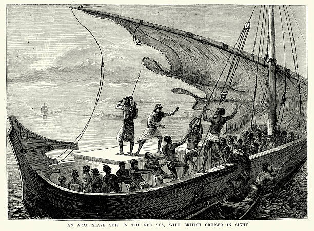 Arab slave-ship in the Red Sea fleeing from Royal Navy Vintage engraving of a Arab slave ship in the Red Sea fleeing from a Royal Navy cruiser. The Graphic, 1874 dhow stock illustrations