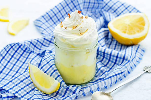 istock layered dessert with lemon cream, ice cream and whipped cream 470664740