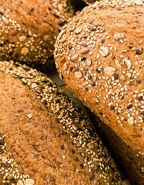 pães variados - bread soda bread baked sesame - fotografias e filmes do acervo