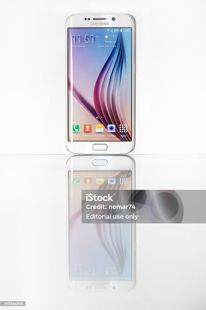 Shot of New Samsung S6 Edge Belgrade, Serbia - April 20, 2015: Shot of a White Pearl Samsung S6 Edge, quad-core 2,7 GHz with main 16 mp Camera and 440 x 2560 pixels Display Resolution 2015 Stock Photo