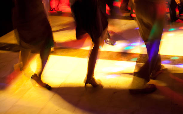 istock Dancing in a circle at club 470668480