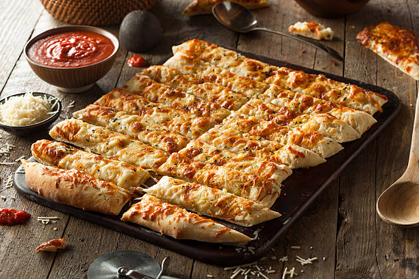 istock Homemade Cheesy Breadsticks with Marinara 470669674