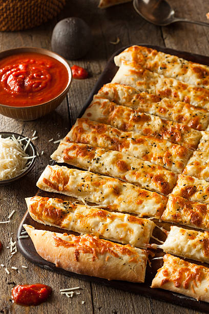 istock Homemade Cheesy Breadsticks with Marinara 470669688