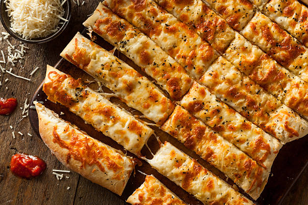 istock Homemade Cheesy Breadsticks with Marinara 470669696