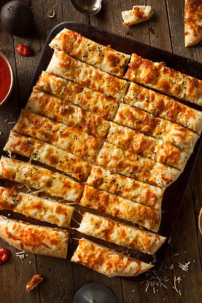 istock Homemade Cheesy Breadsticks with Marinara 470669698