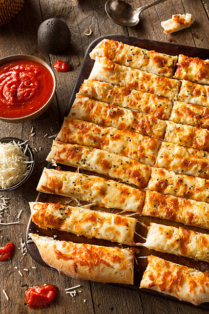 istock Homemade Cheesy Breadsticks with Marinara 470669702