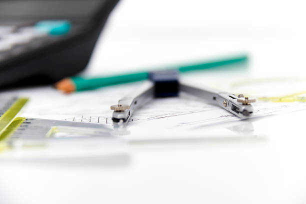 istock Architectural project, pair of compasses, rulers and calculator 470672612