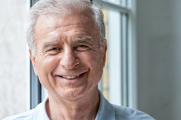 istock Senior Man Smiles about His Future 470673482