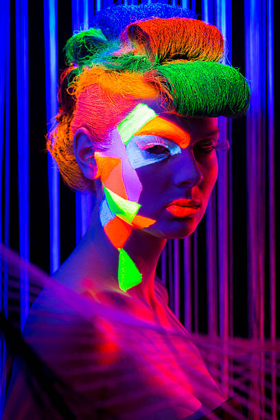 istock Women Portrait in Ultraviolet Light 470673735