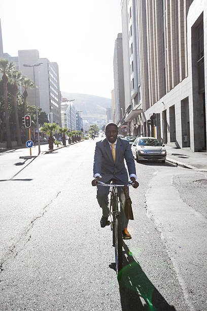 istock African businessman on his bicycle commuting Cape Town. 470675557