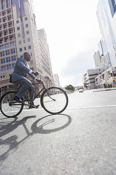 istock African businessman on his bicycle in Cape Town. 470677875