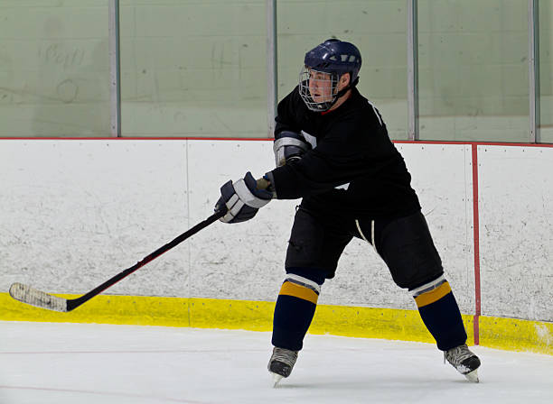 istock Hockey player taking a shot 470677891