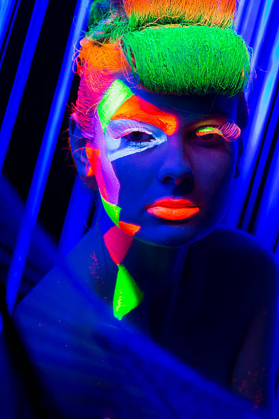 istock Women Portrait in Ultraviolet Light 470678313