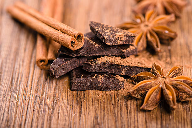 istock chocolate pieces, star anise and cinnamon sticks close up 470682170