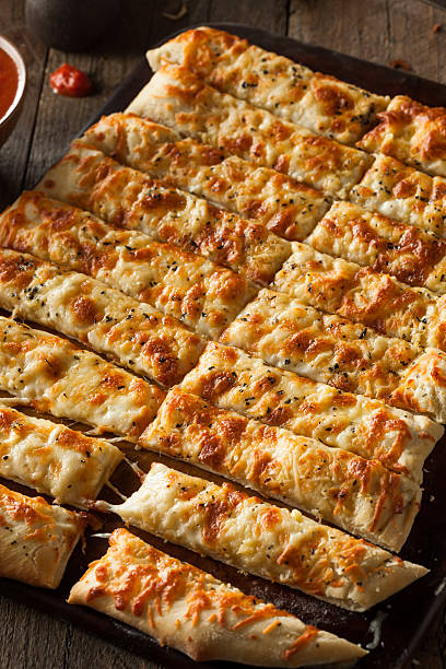 istock Homemade Cheesy Breadsticks with Marinara 470684650