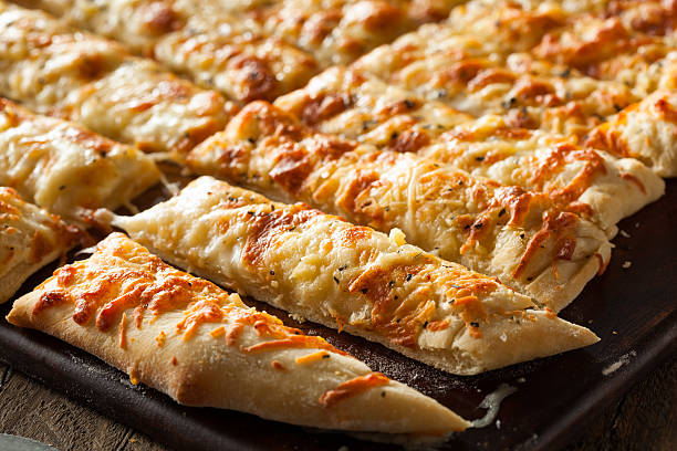 istock Homemade Cheesy Breadsticks with Marinara 470684666