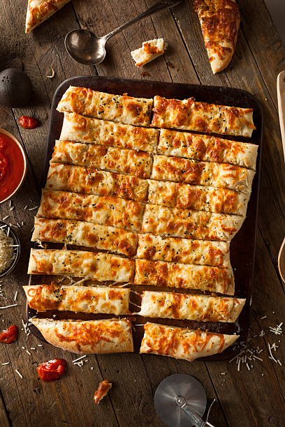 istock Homemade Cheesy Breadsticks with Marinara 470684822