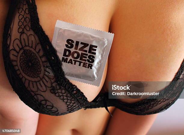 Size Does Matter Stock Photo - Download Image Now - Breast, Large, Cleavage - Breasts