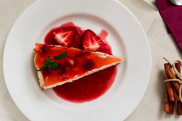 Italian traditional dessert cheesecake of ricotta with strawberry