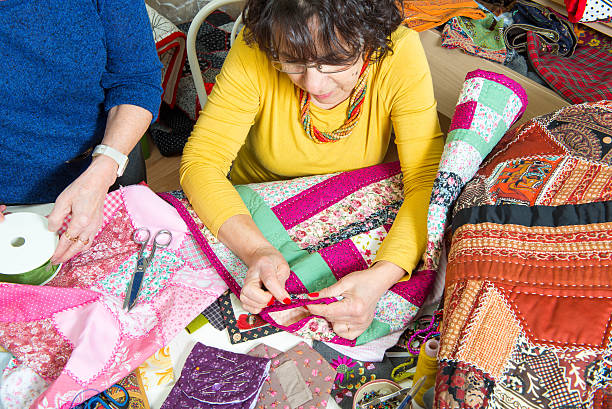 istock two women working on their quilting 470691938