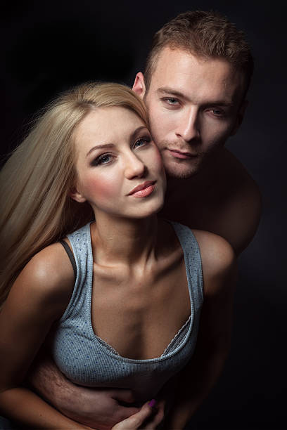 istock Young couple hugging. isolated shot 470692132