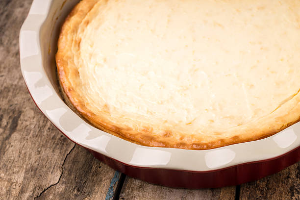 istock Fresh baked cheesecake on wooden table. 470694650