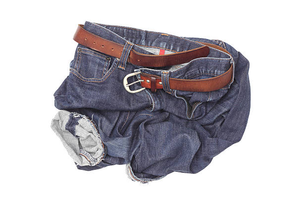 istock jeans a pile on the white. 470695504