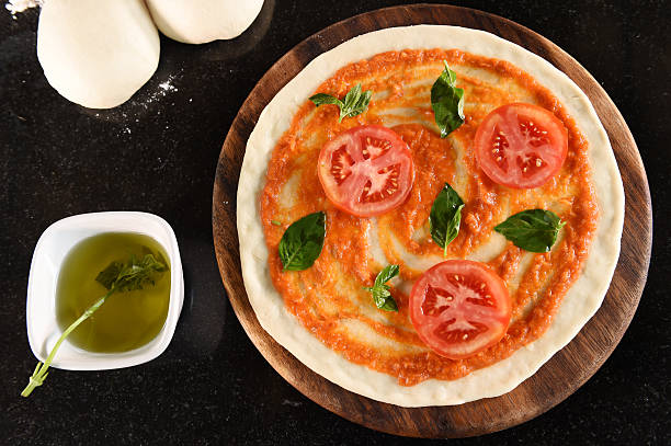 istock pizza and ingredients for pizza 470695628