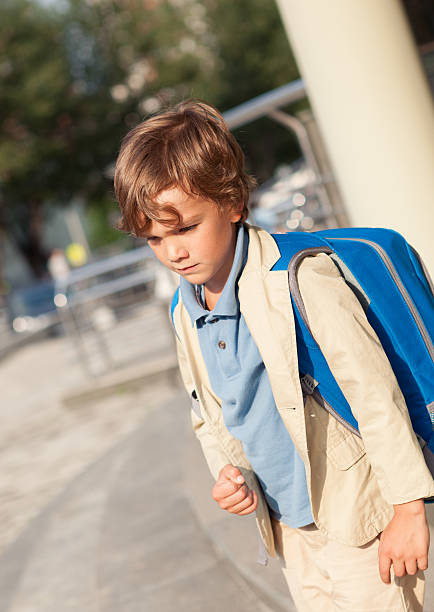 istock Portrait of happy schoolboy with  backpack 470697208