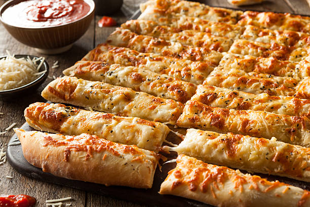 istock Homemade Cheesy Breadsticks with Marinara 470697998