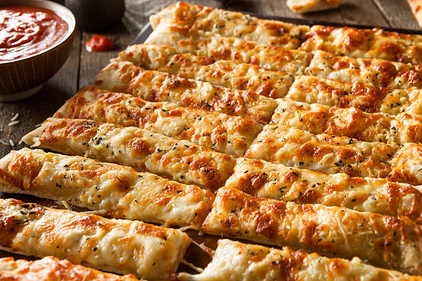 istock Homemade Cheesy Breadsticks with Marinara 470698108