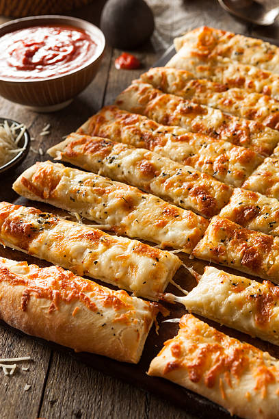 istock Homemade Cheesy Breadsticks with Marinara 470698110